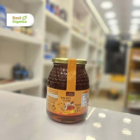 عسل نحل نقي طبيعي من أزهار برية. ( اسباني )